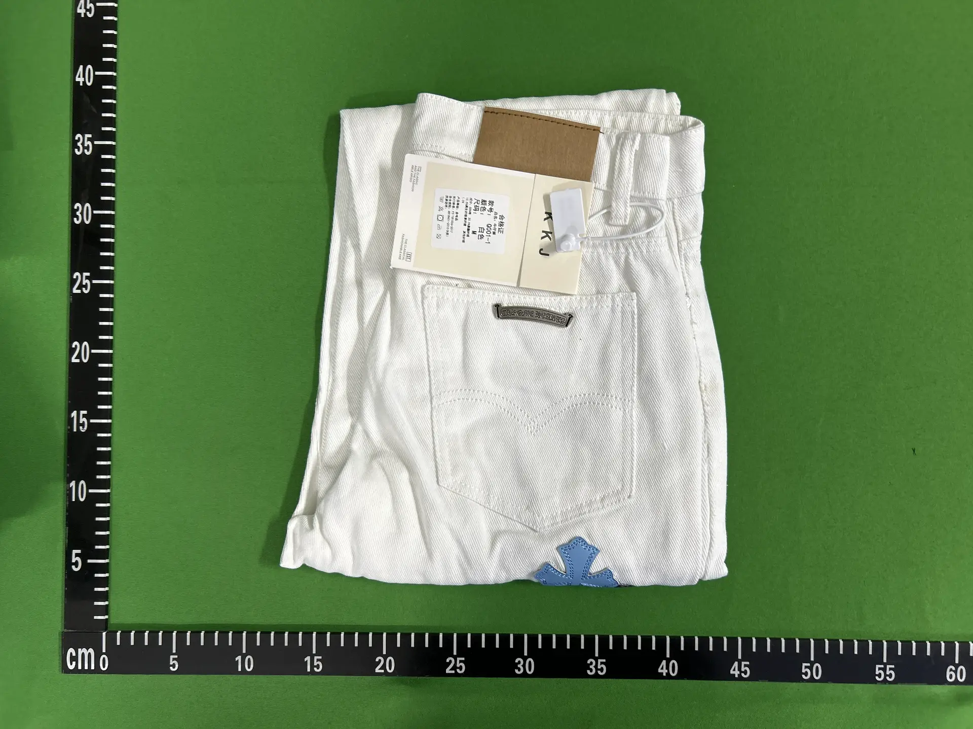 Cross Pendant Washed Jeans